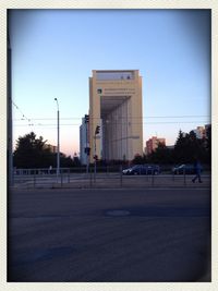 View of road against clear blue sky