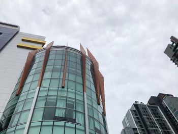 Low angle view of modern buildings against sky