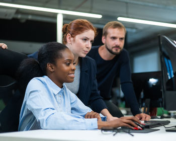 Business colleagues working in office