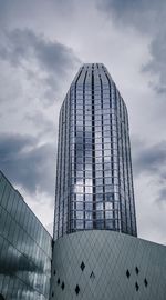 Low angle view of modern building against sky