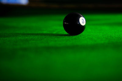 Close-up of ball on pool table