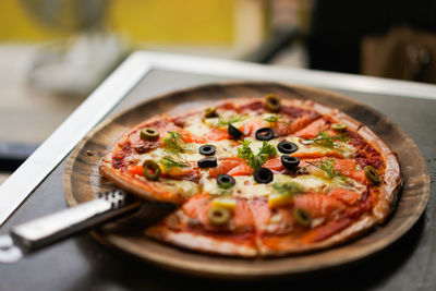 Close-up of pizza served in plate