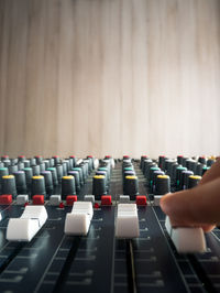 Close-up of man playing sound mixer