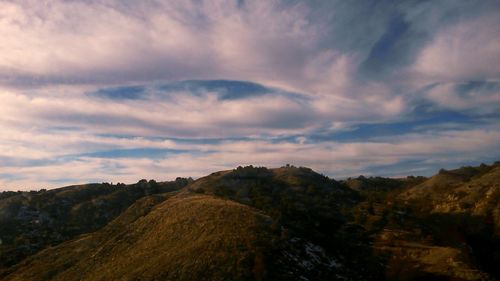 View of landscape against cloudy sky