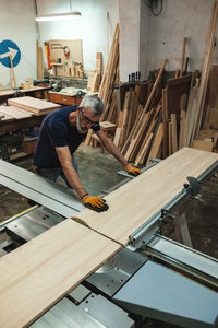 Man working on wood