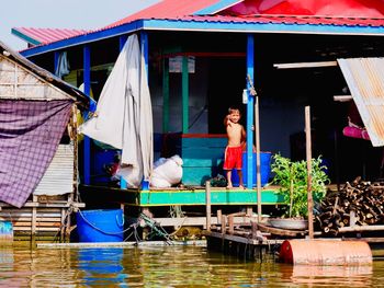 Full length of woman on boat in water