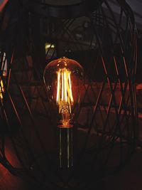 Close-up of illuminated light bulb