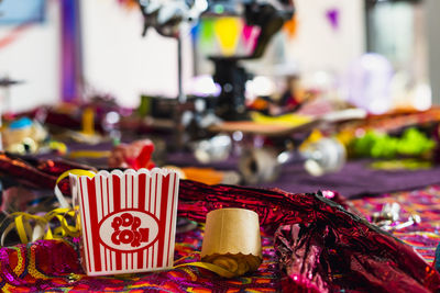 Close-up of popcorn and film shoot party decorations 