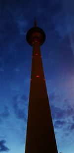 Low angle view of lighthouse against sky in city