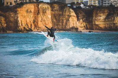 Man surfing in sea