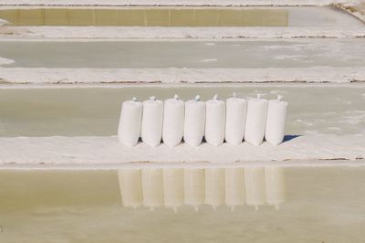 Close-up of salt in sack at basin