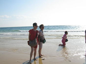 Woman standing on beach