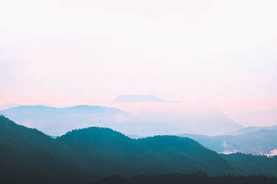 Scenic view of mountains against sky during sunset