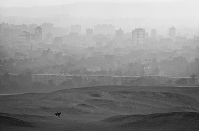 View of cityscape during foggy weather