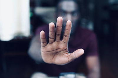 Midsection of person hand