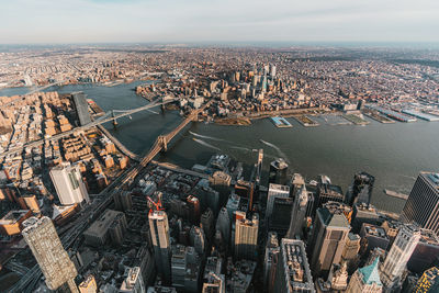 High angle view of city against river