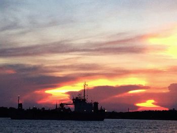 Scenic view of sea at sunset