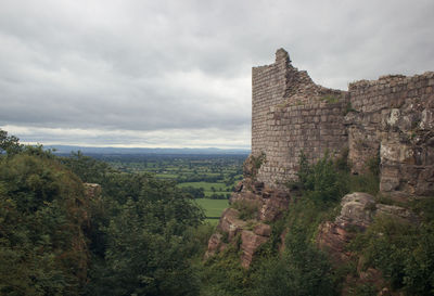 View of castle against cloudy sky