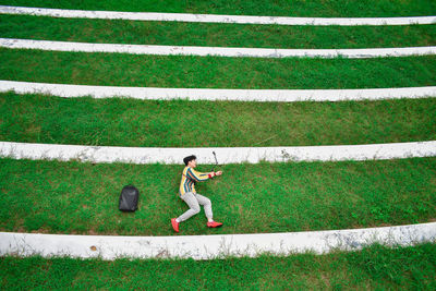 High angle view of man running on field