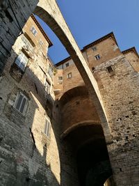 Low angle view of historical building against sky