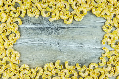 High angle view of yellow painted on table