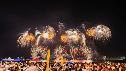 Firework display at night