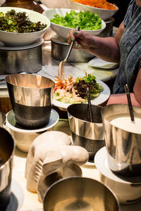 Close-up of man preparing food