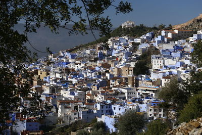 Buildings in city against clear sky, chefchaouen morocco 