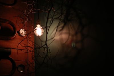 Illuminated street light at night