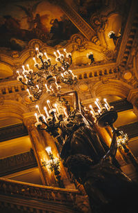 Low angle view of illuminated chandelier