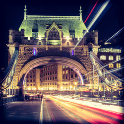 Light trails on bridge at night