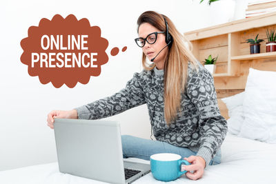 Young woman using mobile phone
