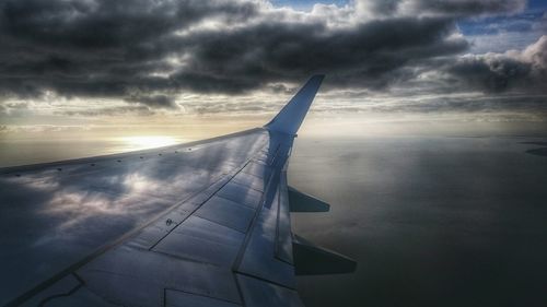 Scenic view of cloudy sky at sunset
