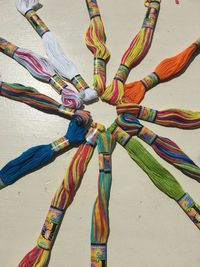 High angle view of multi colored umbrellas on table