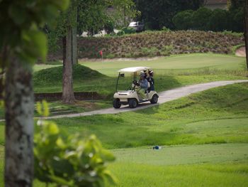 Man riding motorcycle on grass