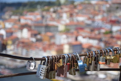 Close-up of padlocks on railing