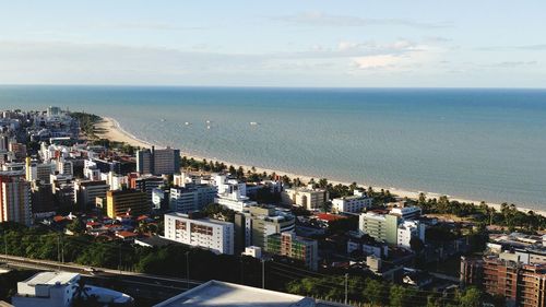 Cityscape with sea in background