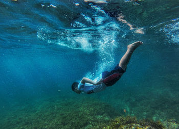 Man swimming in sea