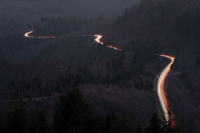 Light trails on a curvy road through the black forest