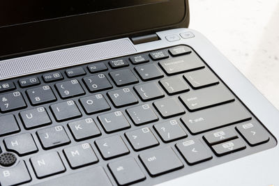 High angle view of laptop on white background