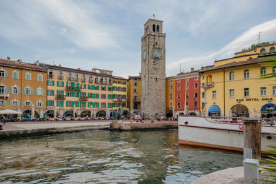 View of buildings against cloudy sky