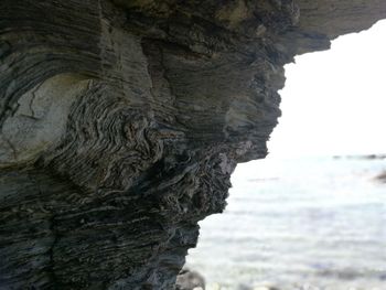 Close-up of rock formation in sea