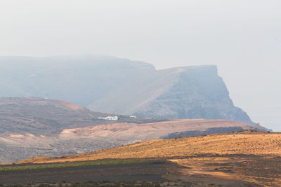 Scenic view of mountains against clear sky