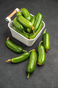 High angle view of green chili peppers on table