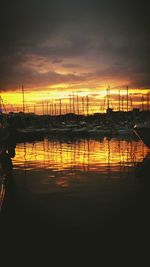 Silhouette of harbor at sunset