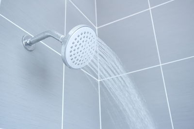 Close-up of water splashing in bathroom