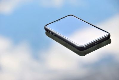 Close-up of smart phone on table