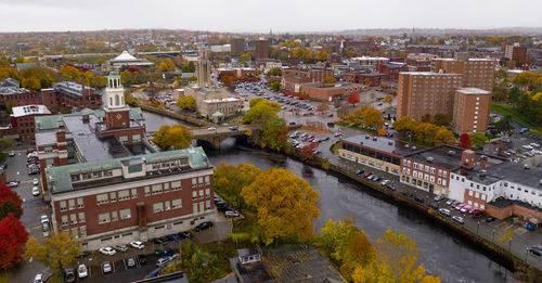 High angle view of river amidst buildings in city