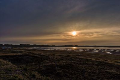 Scenic view of sunset over sea