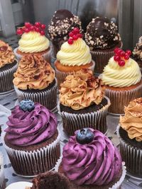 Various cupcakes on table